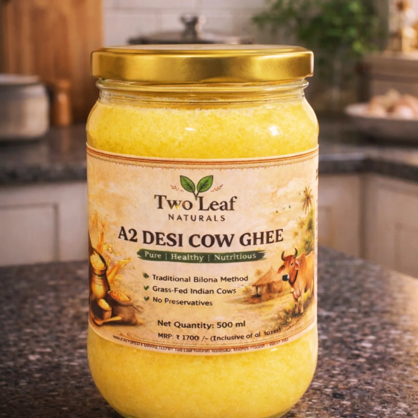 Jar of Two Leaf Naturals A2 Desi Cow Ghee on a kitchen counter